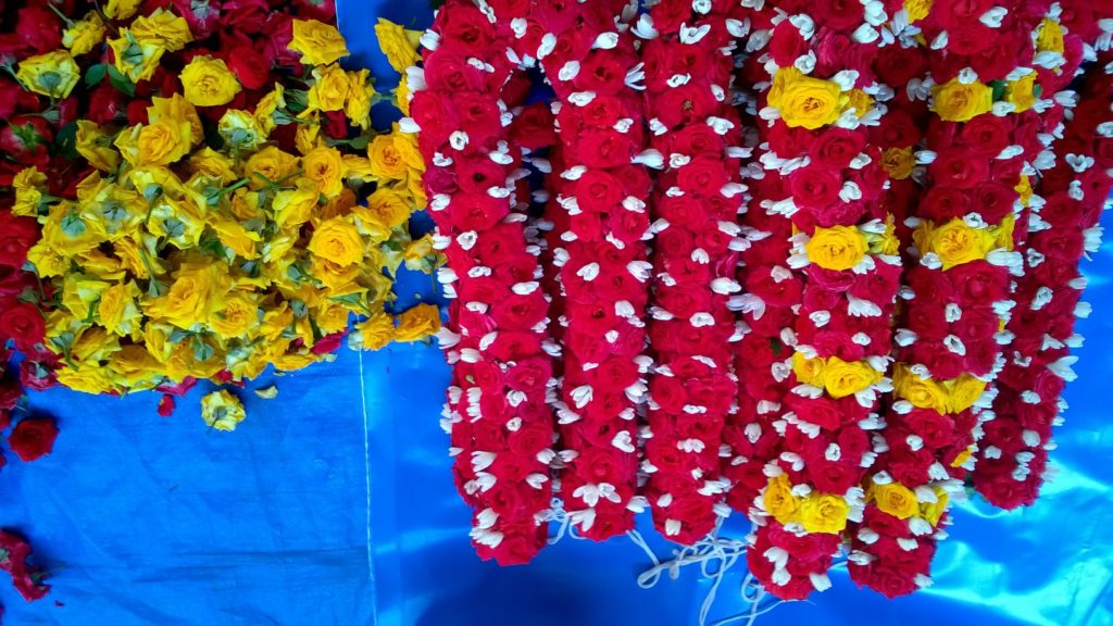 Flower garlands being readied at a local market in Gandhi Bazaar in Bangalore