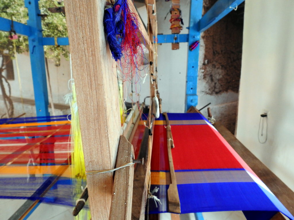A saree being woven on the hand loom