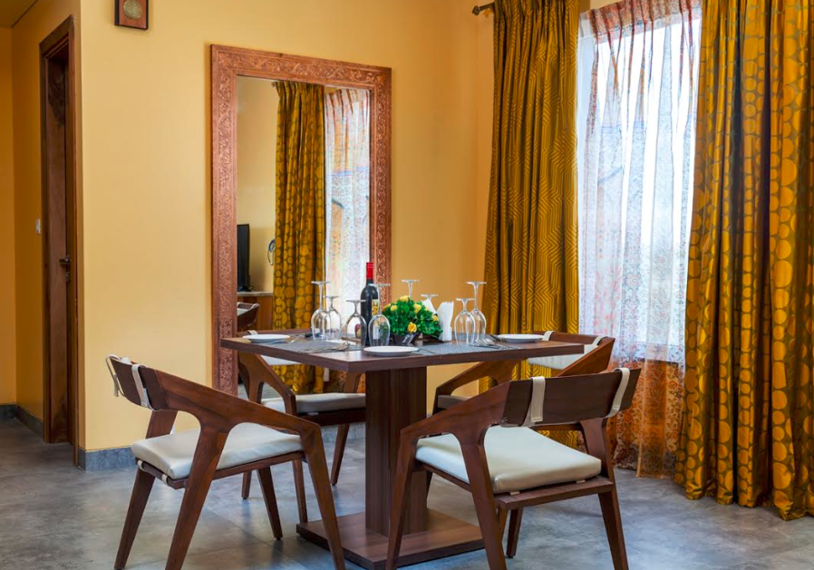Dining space in room at jüSTa Sajjangarh Resort & Spa