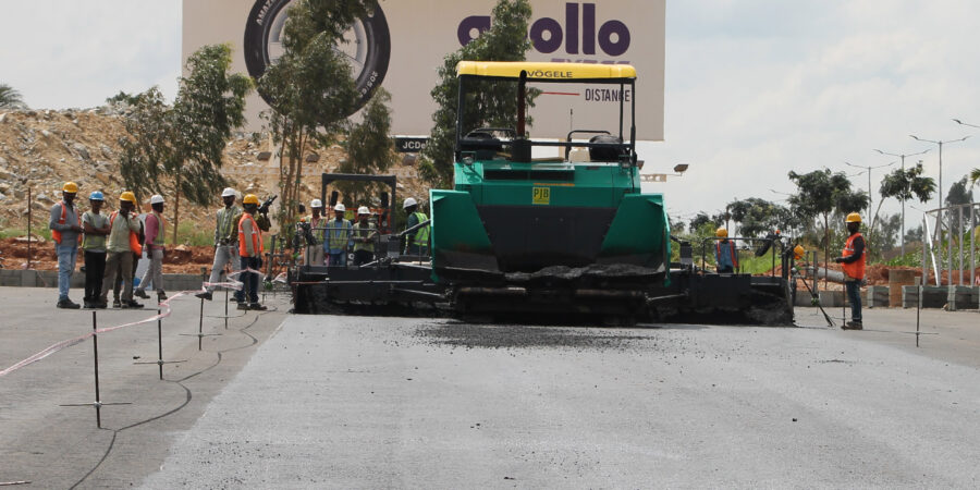 Laying of Polymerized Road